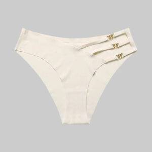 Set of beige women's underwear with gold accents on a white background